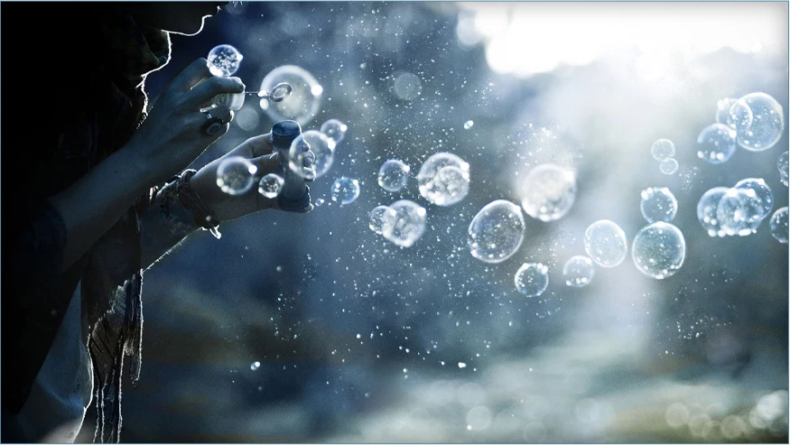 Child blowing bubbles