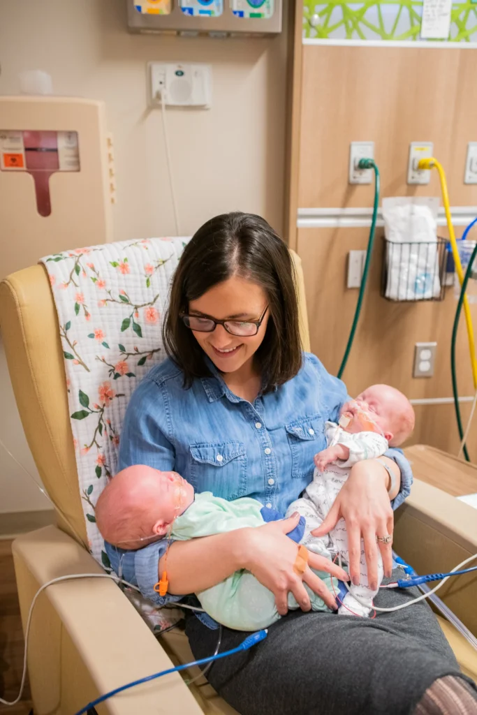 mother holding 2 NICU babies